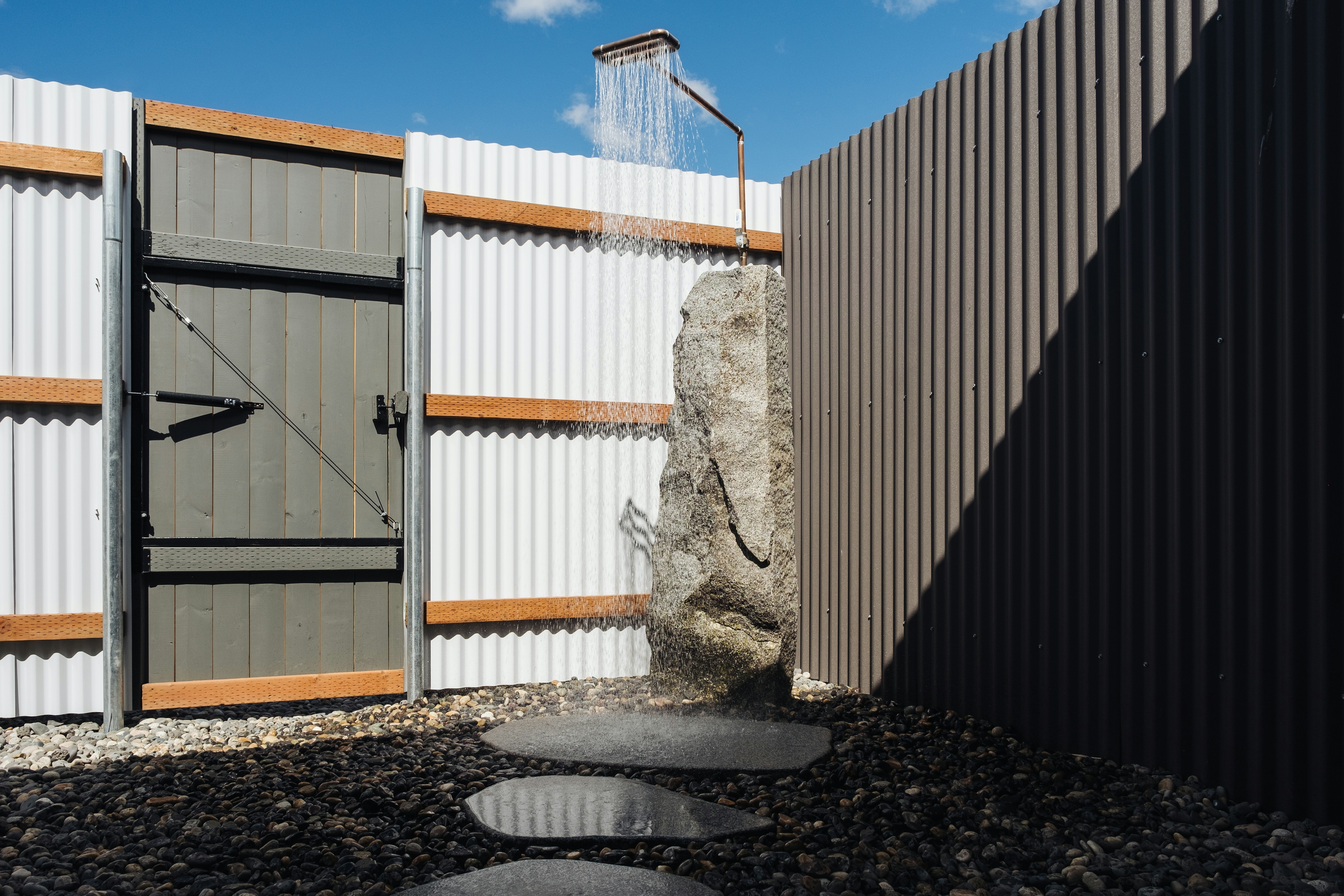 Hot water outdoor shower in your private Zen garden