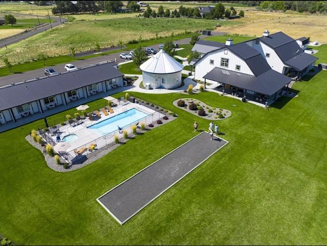 The Barn Walla Walla from above — the inn, bocce court and pool